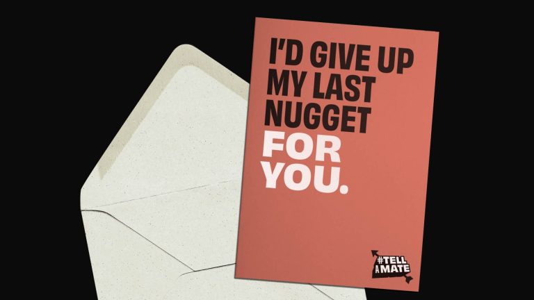 Image of an open envelope and orange greetings card, with a message on it that says 'I'd give up my last nugget for you'